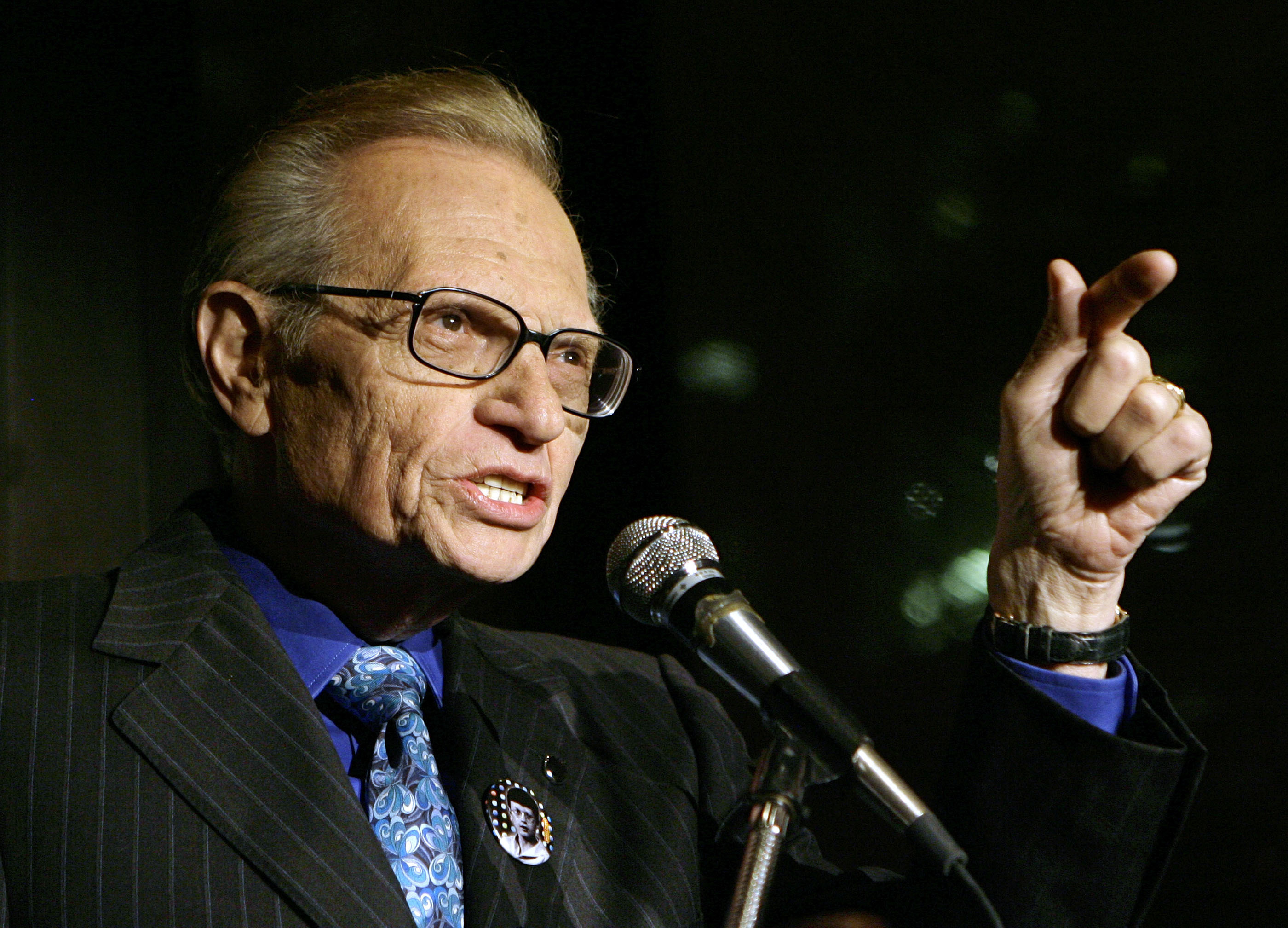 In this April 18, 2007 file photo, Larry King speaks to guests at a party held by CNN, celebrating King's fifty years of broadcasting in New York. (AP Photo/Stuart Ramson, File)