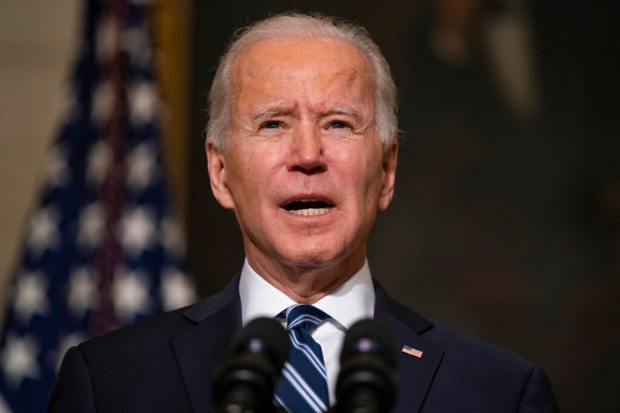 In this Jan. 27, 2021, photo, President Joe Biden speaks in the State Dining Room of the White House in Washington.