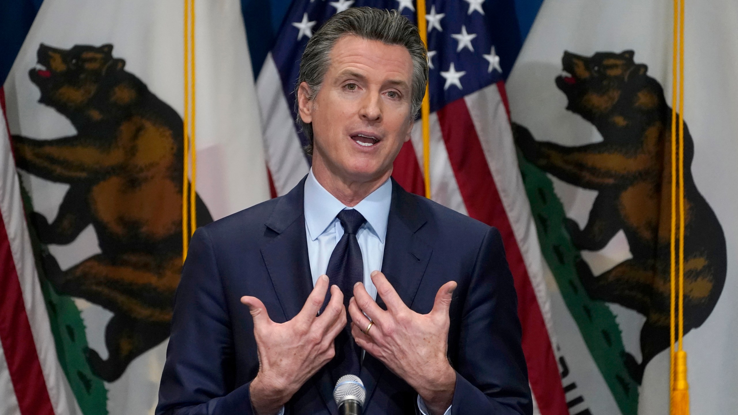 In this Jan. 8, 2021, file photo, California Gov. Gavin Newsom outlines his 2021-2022 state budget proposal during a news conference in Sacramento, Calif. (AP Photo/Rich Pedroncelli, Pool)