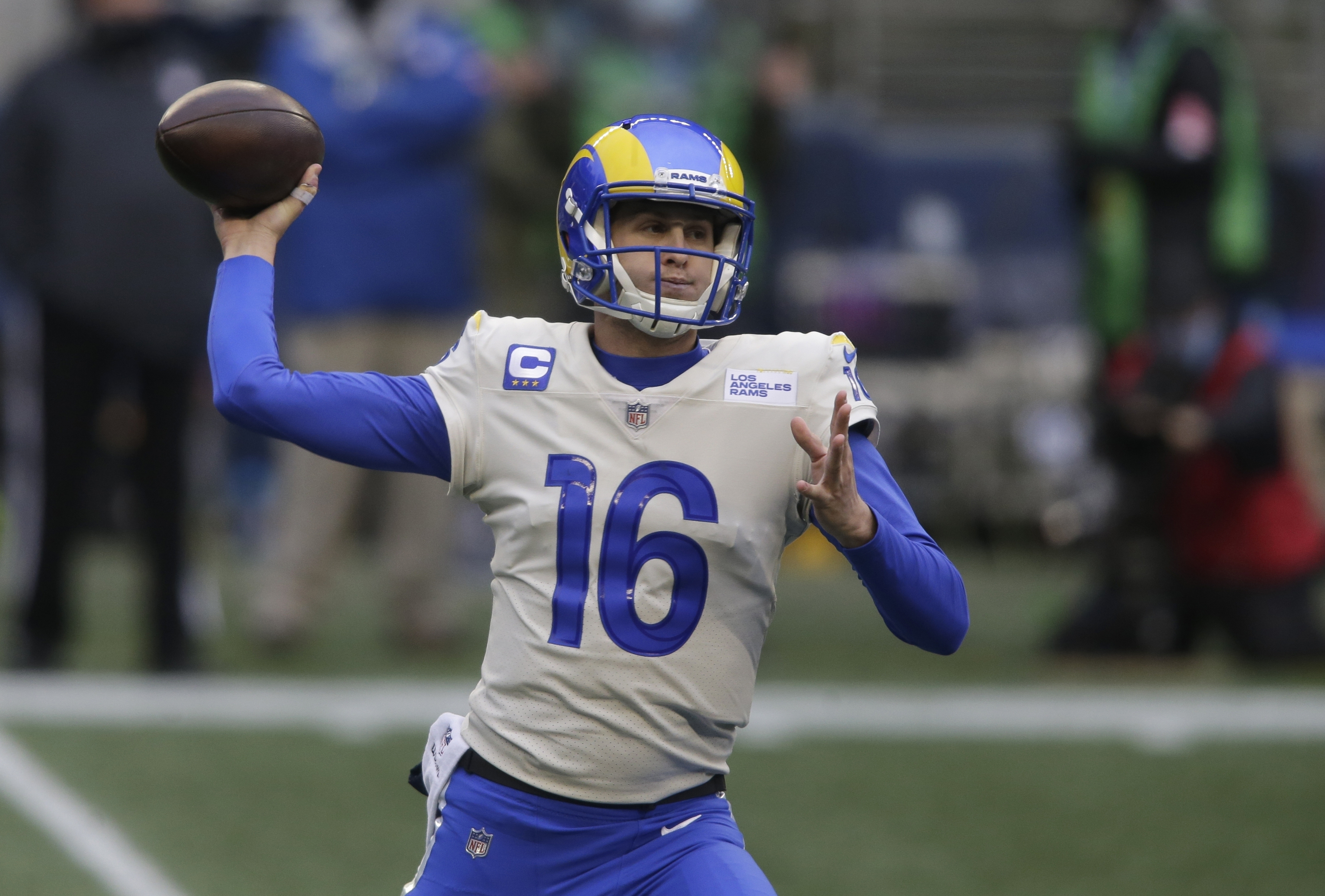 In this Jan. 9, 2021, file photo, Los Angeles Rams quarterback Jared Goff throws a pass against the Seattle Seahawks during the first half of an NFL wild-card playoff football game in Seattle. (AP Photo/Scott Eklund)