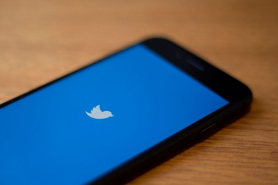 The Twitter logo is seen on a phone in this photo illustration in Washington, DC, on July 10, 2019. (ALASTAIR PIKE/AFP via Getty Images)