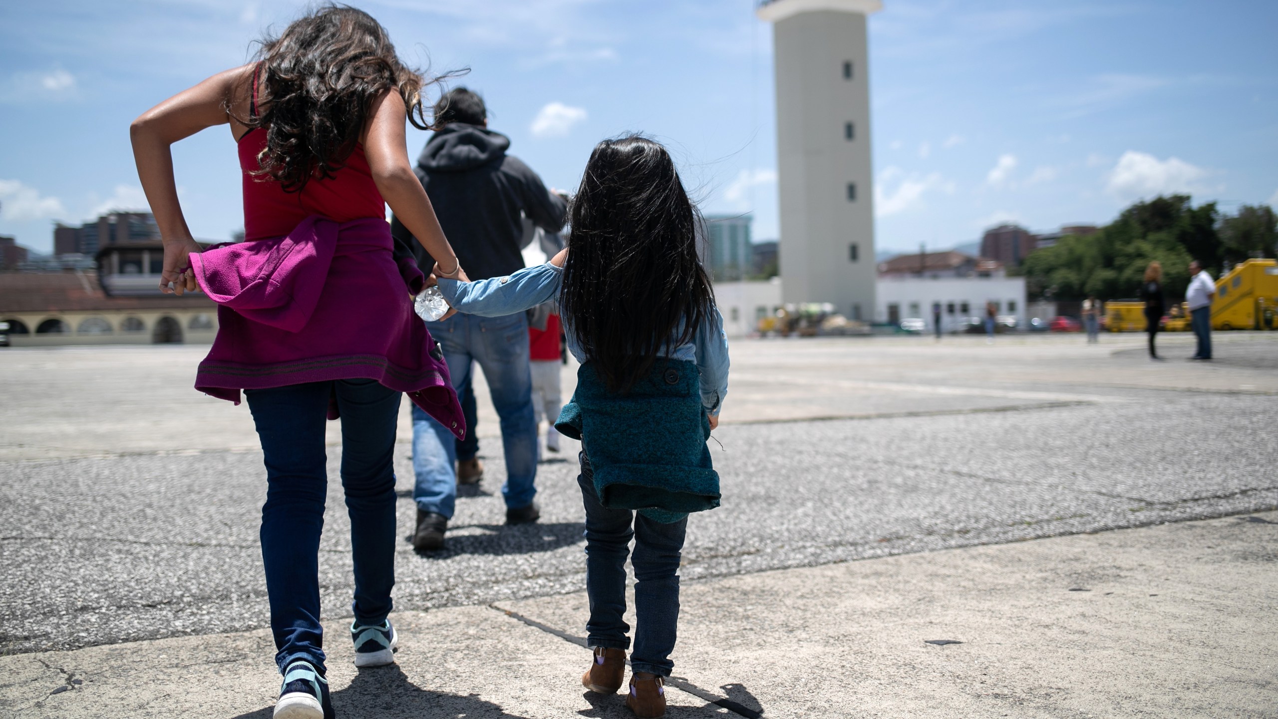 Guatemalan youth arrive on an ICE deportation flight from Brownsville, Texas, to Guatemala City on Aug. 29, 2019. (John Moore / Getty Images)