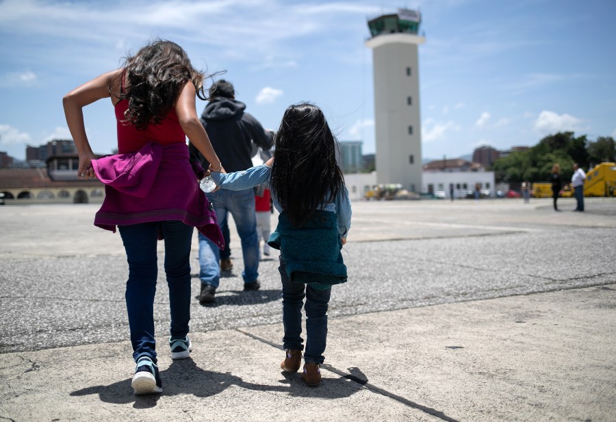 Guatemalan youth arrive on an ICE deportation flight from Brownsville, Texas, to Guatemala City on Aug. 29, 2019. (John Moore / Getty Images)