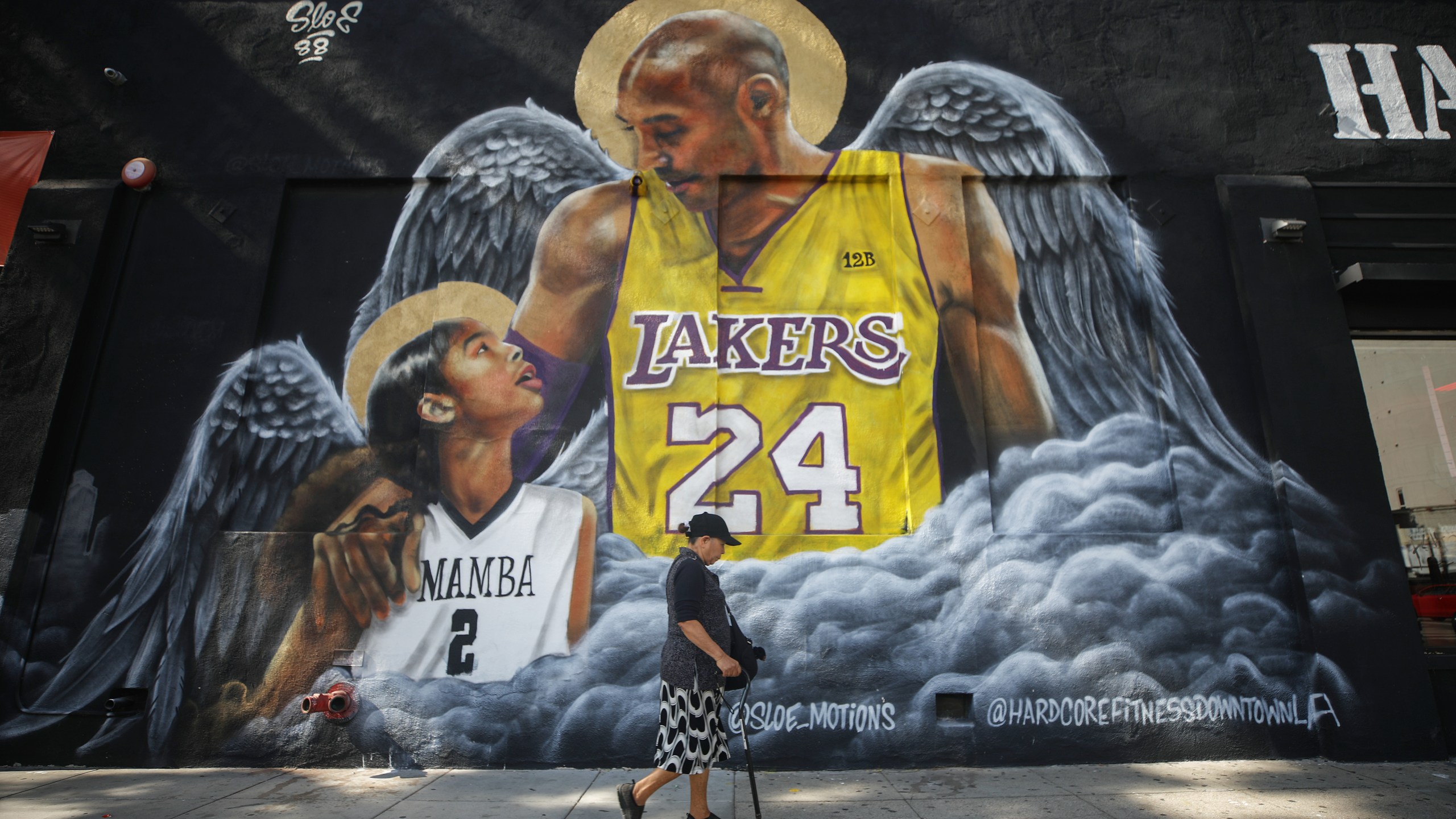 A mural depicting deceased NBA star Kobe Bryant and his daughter Gianna, painted by @sloe_motions, is displayed on a building on February 13, 2020 in Los Angeles, California. (Mario Tama/Getty Images)