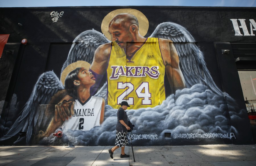 A mural depicting deceased NBA star Kobe Bryant and his daughter Gianna, painted by @sloe_motions, is displayed on a building on February 13, 2020 in Los Angeles, California. (Mario Tama/Getty Images)