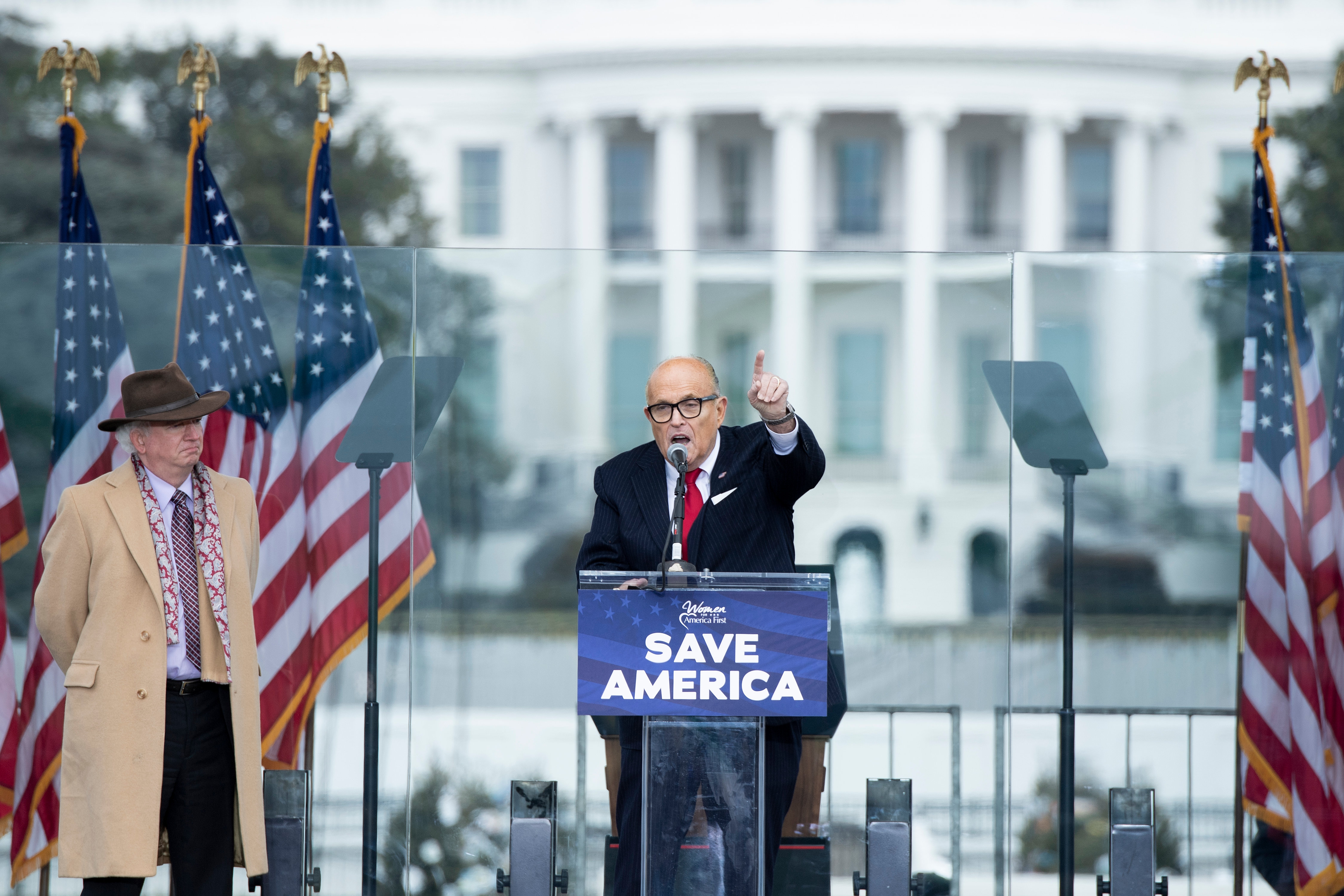 Chapman University professor John Eastman stands next to Rudy Giuliani during a rally near the White House in Washington, D.C., on Wednesday, Jan. 6, 2021. (BRENDAN SMIALOWSKI/AFP via Getty Images)