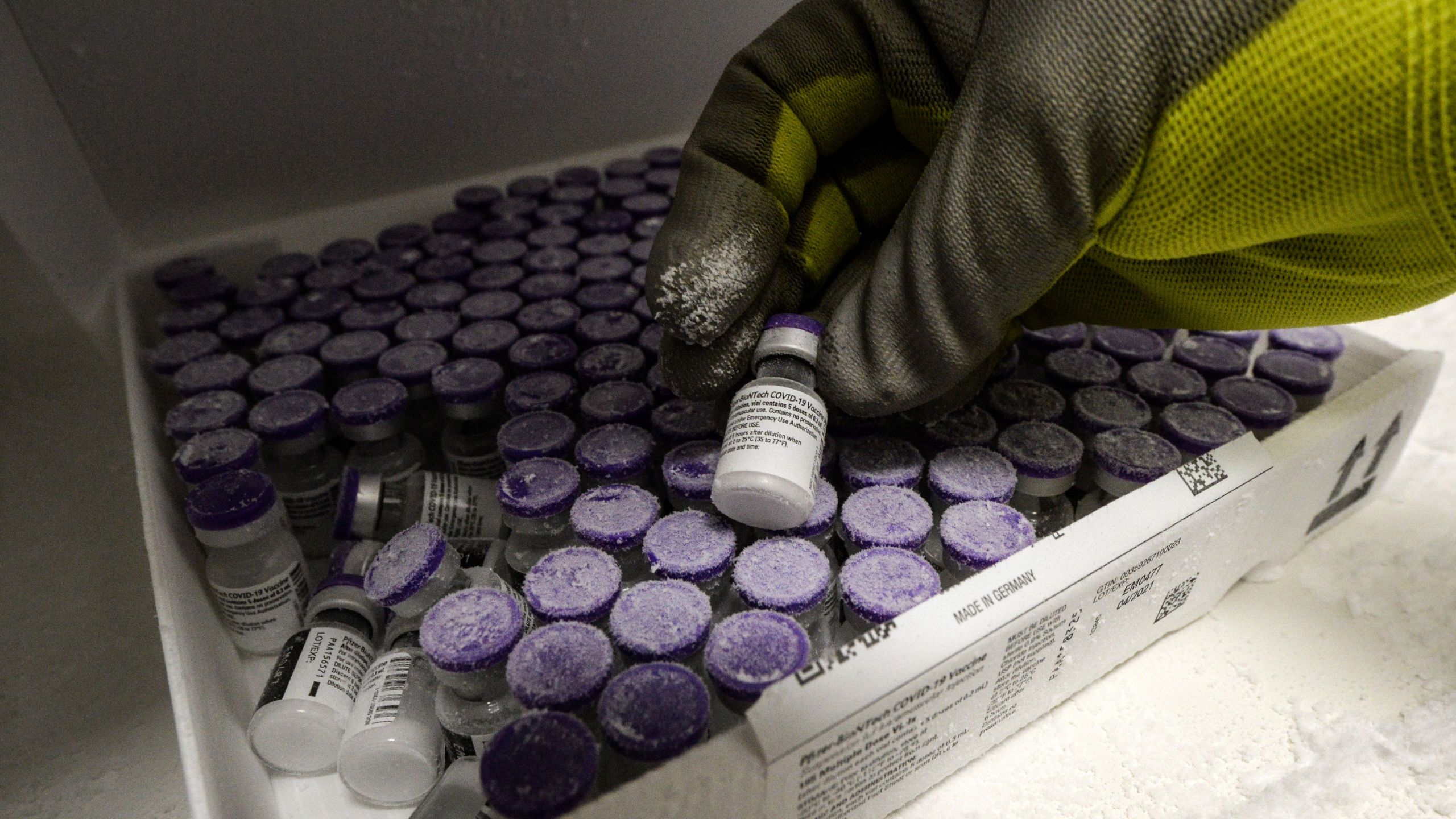 A picture taken on Jan. 15, 2021, shows a pharmacist holding a vial of the Pfizer COVID-19 vaccine . (JEAN-FRANCOIS MONIER/AFP via Getty Images)