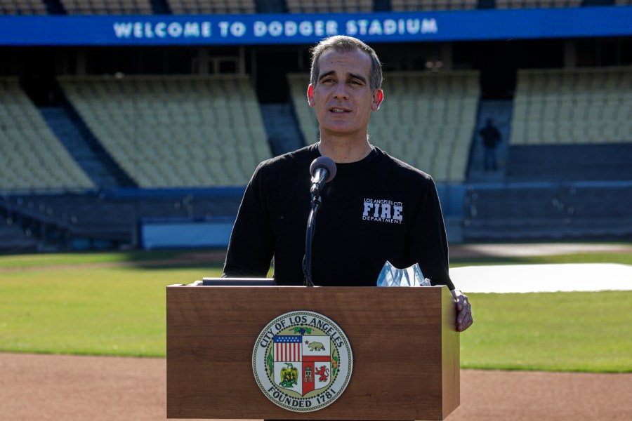 Los Angeles Mayor Eric Garcetti addresses a press conference held at the launch of a mass COVID-19 vaccination site at Dodger Stadium on Jan. 15, 2021. (Irfan Khan / AFP / Getty Images)