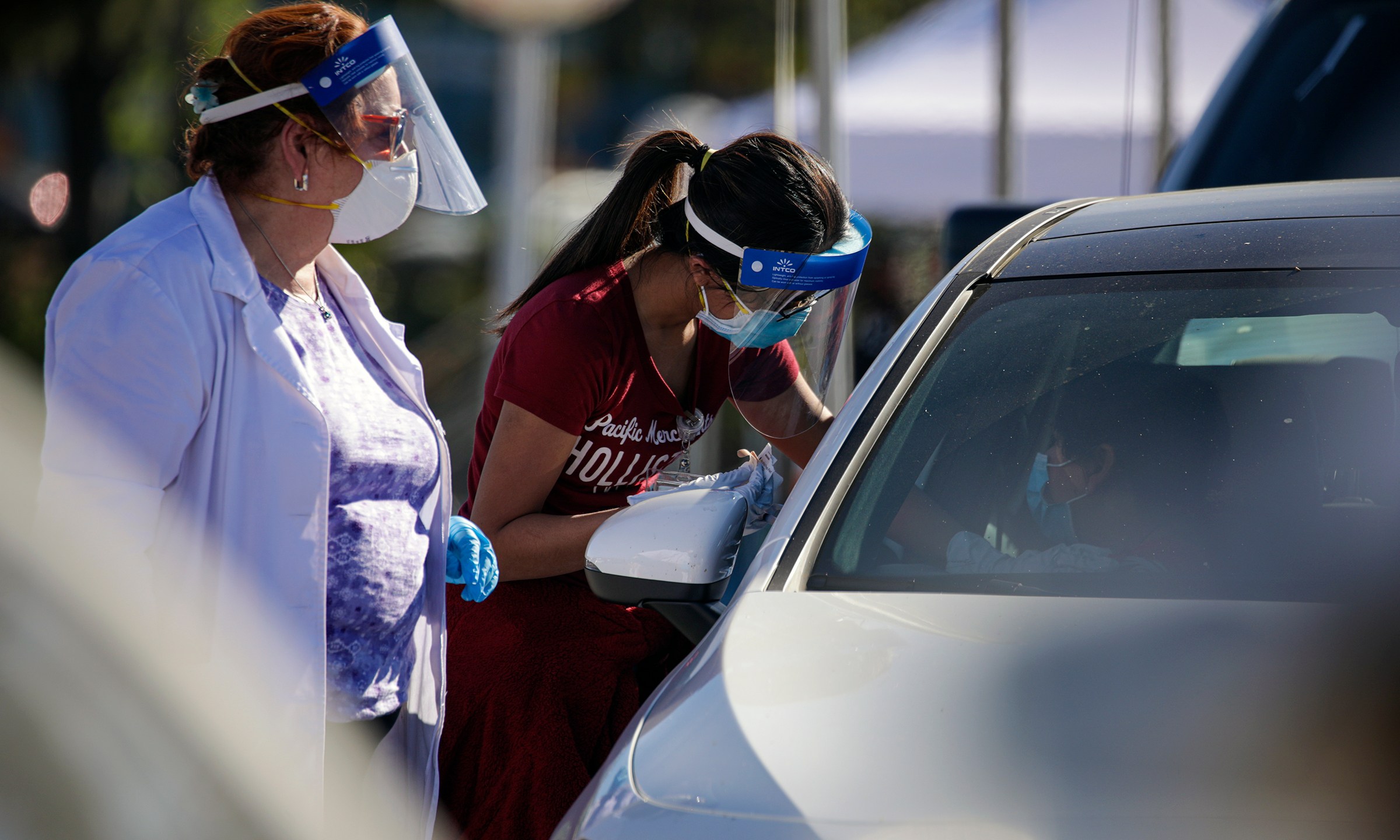 COVID-19 mass-vaccination of health care workers takes place at Dodger Stadium on Jan. 15, 2021 in Los Angeles. (IRFAN KHAN/POOL/AFP via Getty Images)