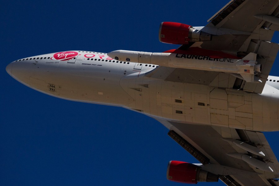 The Virgin Orbit "Cosmic Girl" - a modified Boeing Co. 747-400 carrying a LauncherOne rocket under it's wing - takes off for the Launch Demo 2 mission from Mojave Air and Space Port on January 17, 2021 in Mojave, California. (Patrick T. Fallon/AFP via Getty Images)