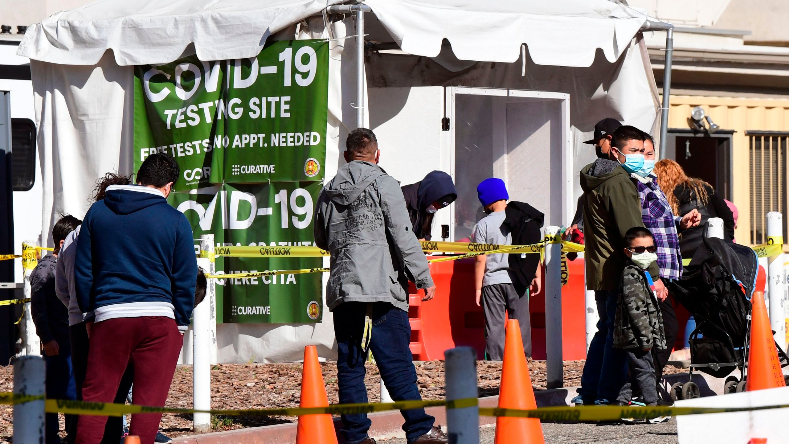 People arrive at a walk-up COVID-19 testing site at Lincoln Park in Los Angeles on Jan. 28, 2021. (Frederic J. Brown / AFP / Getty Images)