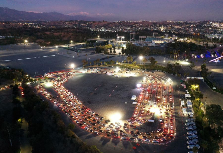 This drone image shows vehicles line up at a coronavirus testing site at Dodger Stadium ahead of the New Year’s holiday on Dec. 30, 2020 in Los Angeles. (Mario Tama/Getty Images)