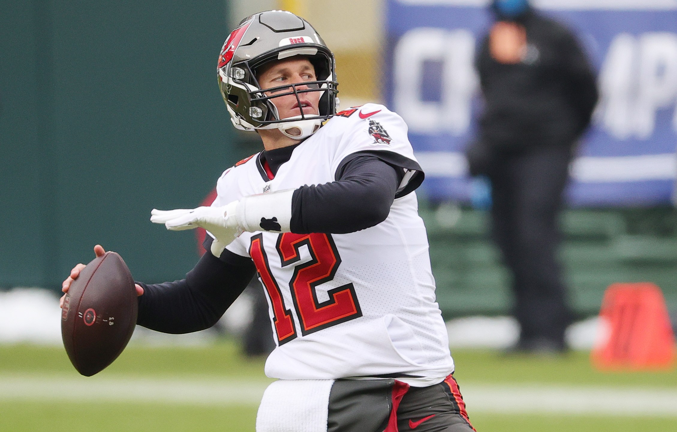 Tom Brady #12 of the Tampa Bay Buccaneers warms up prior to their NFC Championship game against the Green Bay Packers at Lambeau Field on January 24, 2021 in Green Bay, Wisconsin. (Stacy Revere/Getty Images)