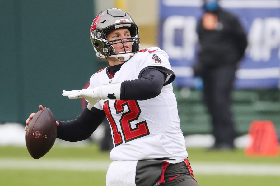 Tom Brady #12 of the Tampa Bay Buccaneers warms up prior to their NFC Championship game against the Green Bay Packers at Lambeau Field on January 24, 2021 in Green Bay, Wisconsin. (Stacy Revere/Getty Images)