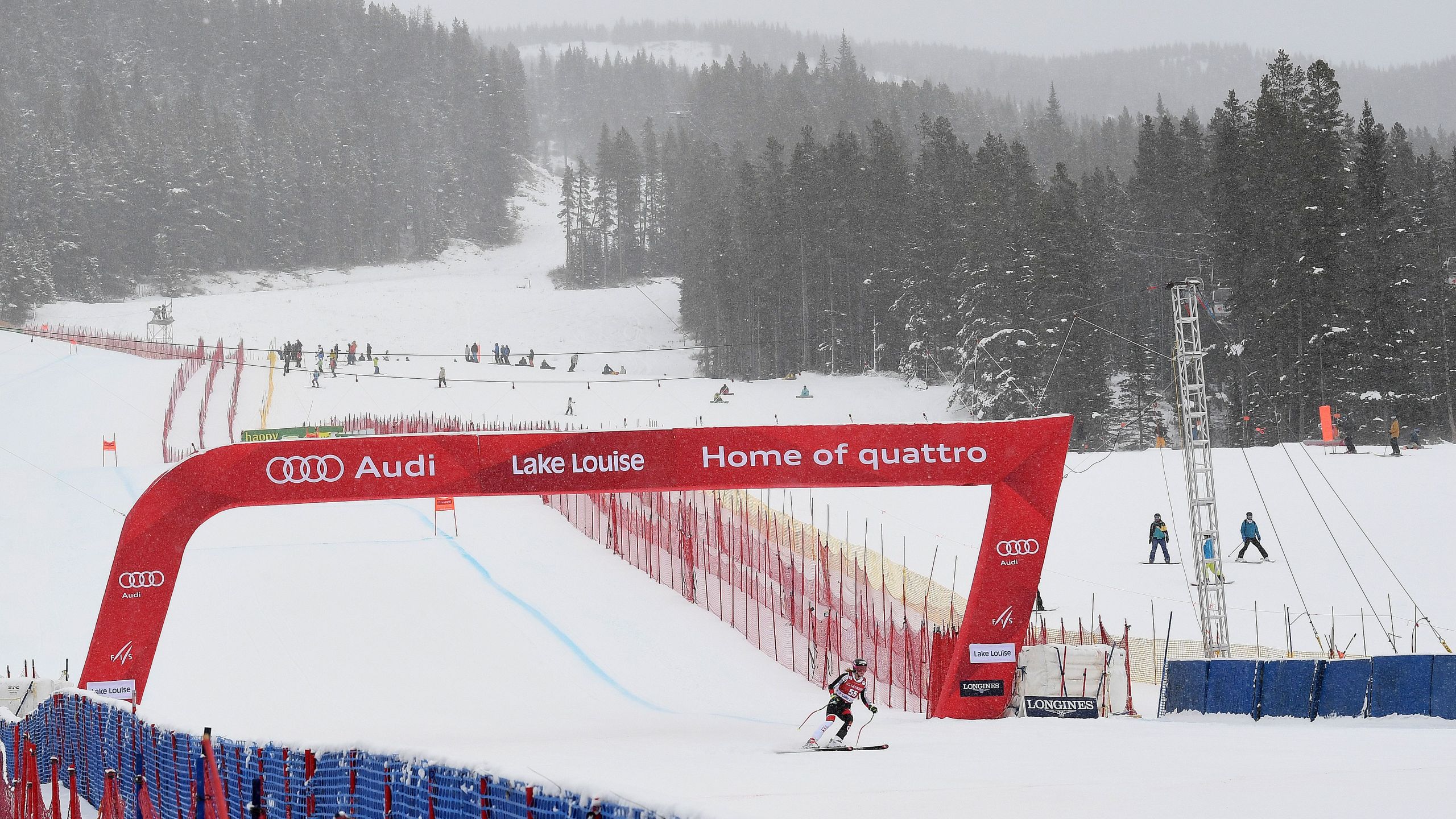 Heavy snow and poor visibility created difficult conditions during the Audi FIS Ski World Cup 2nd Women's Downhill race at the Lake Louise Ski Resort in Alberta, Canada on Dec. 3, 2016. (MARK RALSTON/AFP via Getty Images)