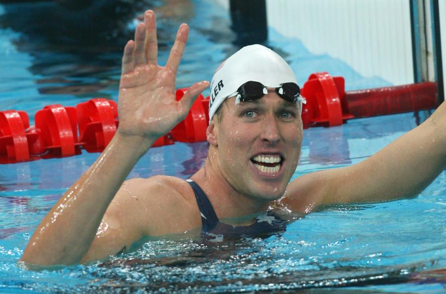 Swimmer Klete Keller smiles after winning the men's 4 x 200m freestyle relay swimming heat in the 2008 Beijing Olympic Games on Aug. 12, 2008. (Greg Wood / AFP / Getty Images)