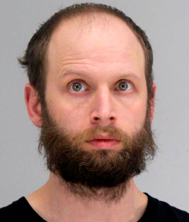 This photo provided by the Dallas County Sheriff's Office shows Garret Miller. (Dallas County Sheriff's Office via AP)