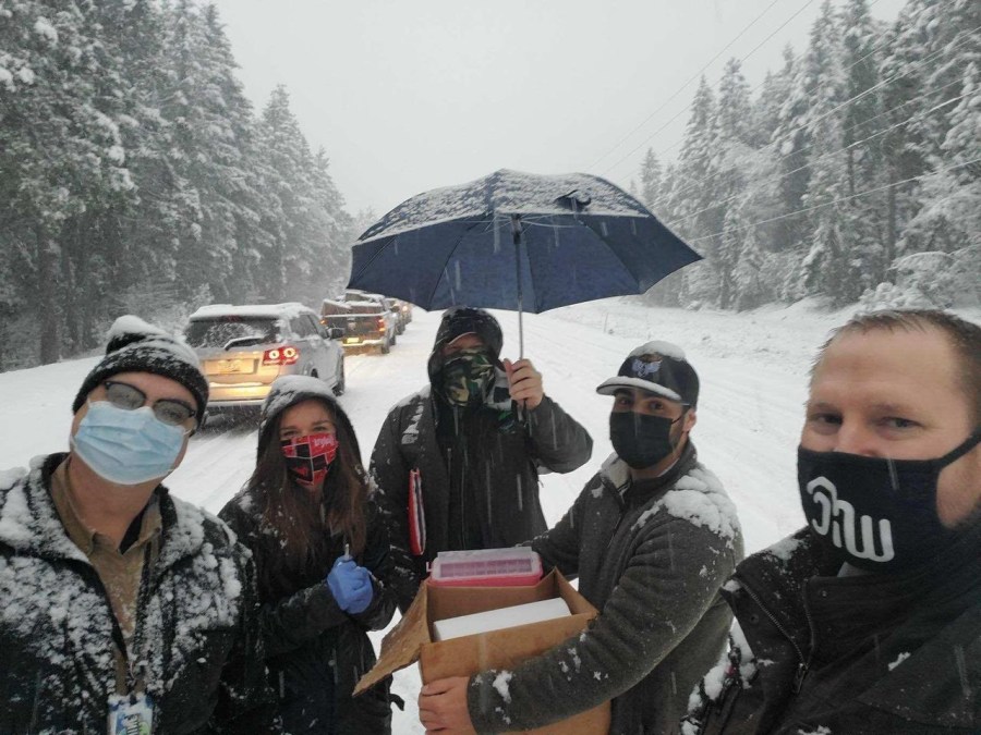 Health care workers caught in a snowstorm in Oregon injected other stranded motorists with the COVID-19 vaccine before the doses went bad. (Josephine County Public Health Department)