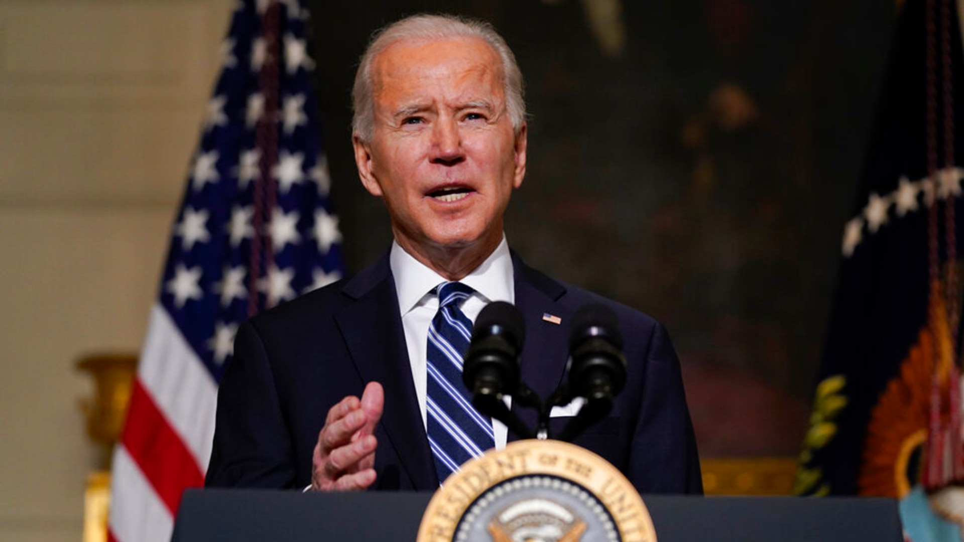 President Joe Biden delivers remarks on climate change and green jobs, in the State Dining Room of the White House, Wednesday, Jan. 27, 2021, in Washington. (AP Photo/Evan Vucci)