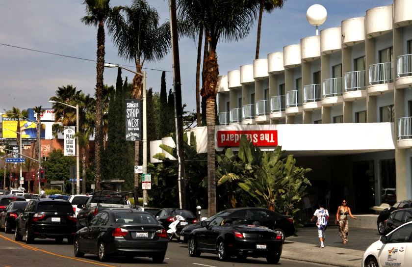 Pedestrians and cars pass the Standard hotel on Sunset Boulevard in West Hollywood in 2014. (Genaro Molina / Los Angeles Times)