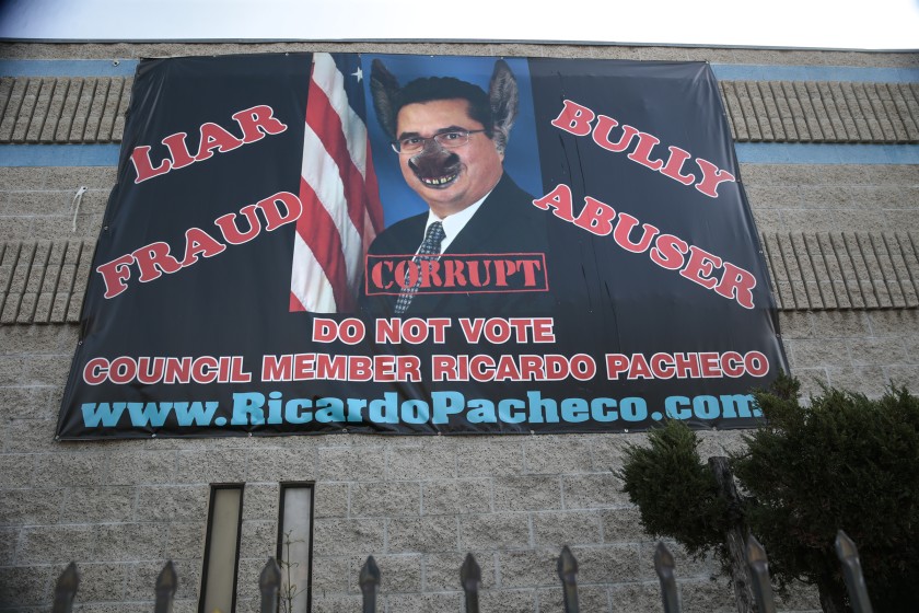 Ricardo Pacheco was accused of corruption in 2020 in a banner that a critic displayed in Baldwin Park months before Pacheco resigned as a member of the Baldwin Park City Council. (Robert Gauthier / Los Angeles Times)