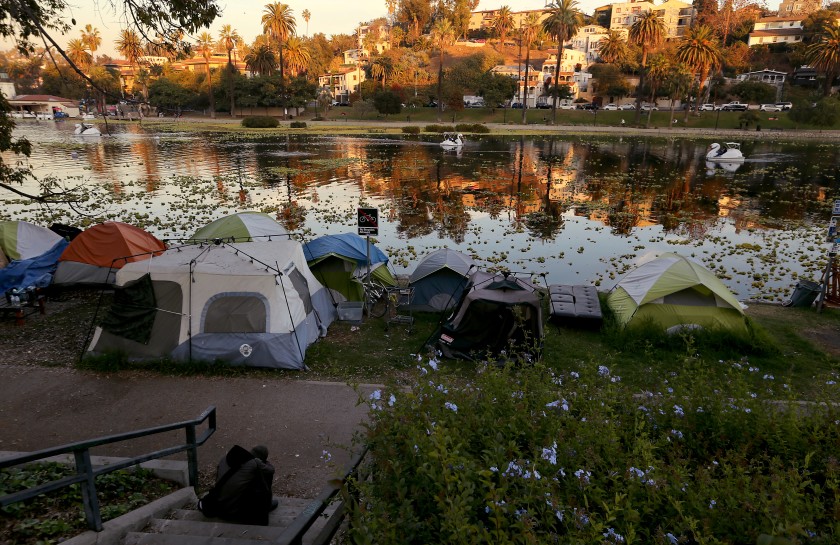 An undated photo shows a homeless encampment on the banks of Echo Park Lake. (Luis Sinco / Los Angeles Times)