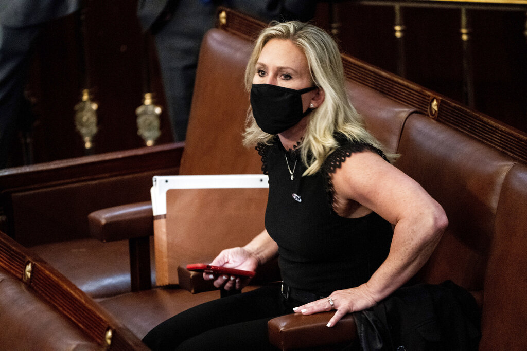 Rep. Marjorie Taylor Greene sits in the House Chamber on Jan.6. (Erin Schaff/The New York Times via AP, Pool, File)