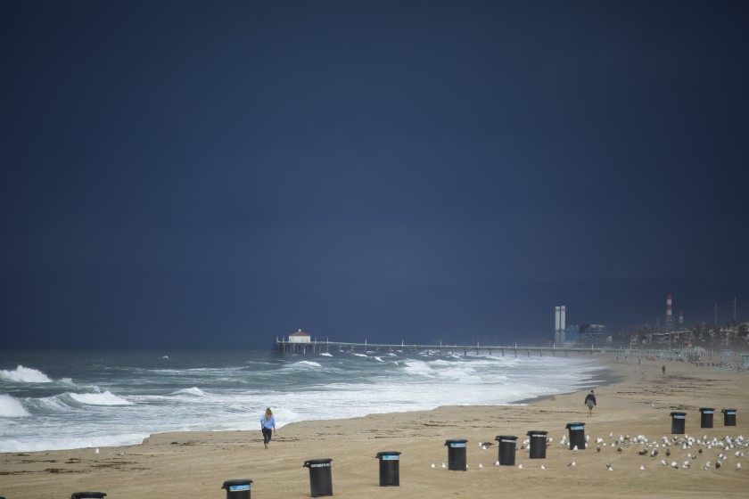 Storm clouds move ashore over Hermosa Beach on Jan. 29, 2021. (Jay L. Clendenin / Los Angeles Times)