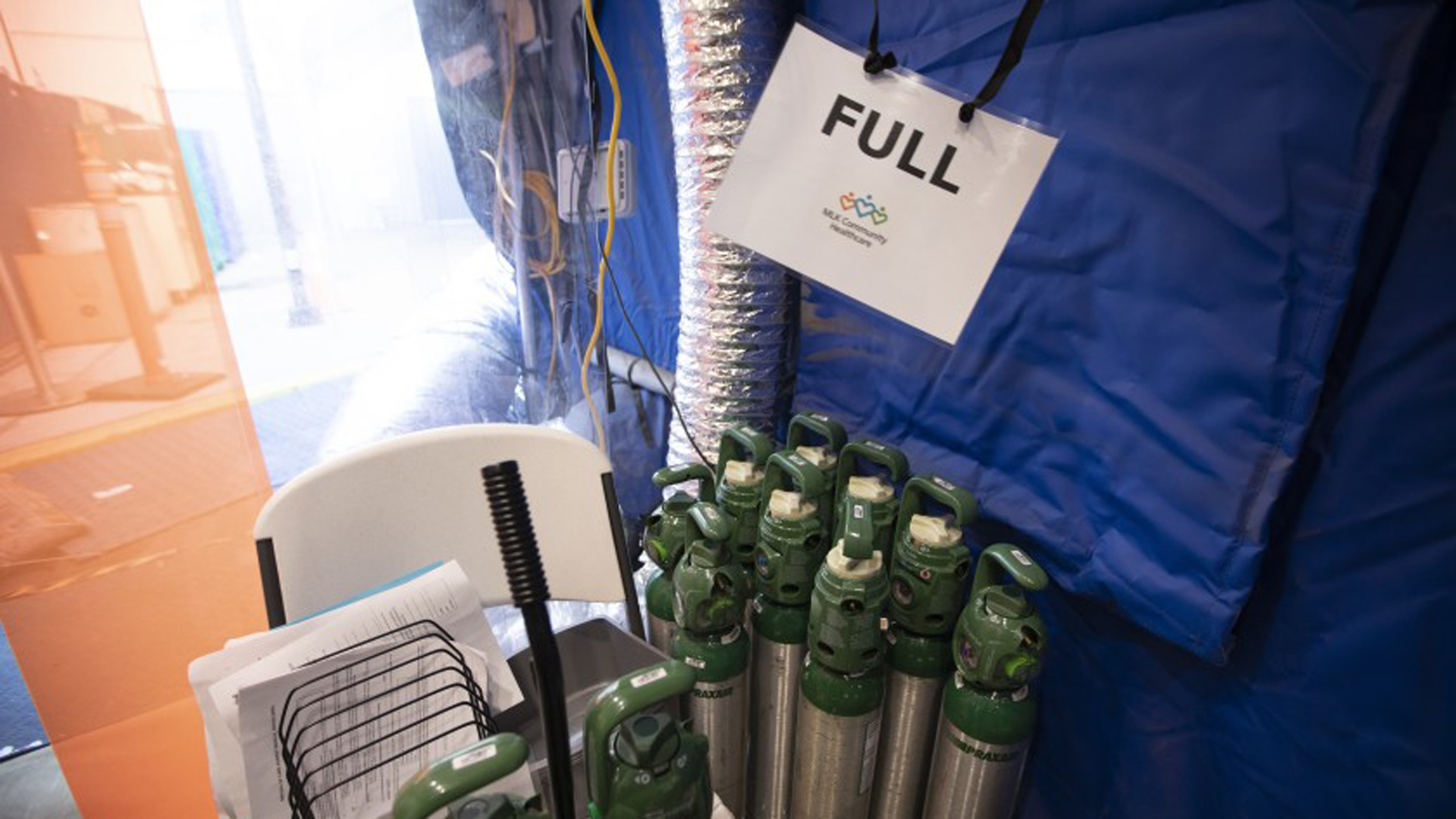 Oxygen tanks are stored in a tent outside Martin Luther King Jr. Community Hospital in this undated photo. Federal engineers will be evaluating the oxygen-delivery systems at six other hospitals in Los Angeles County. (Francine Orr / Los Angeles Times)