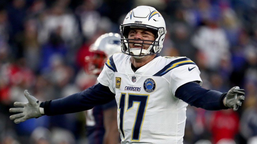 Philip Rivers of the Los Angeles Chargers reacts during the fourth quarter in the AFC Divisional Playoff Game against the New England Patriots at Gillette Stadium on January 13, 2019 in Foxborough, Massachusetts. (Al Bello/Getty Images)