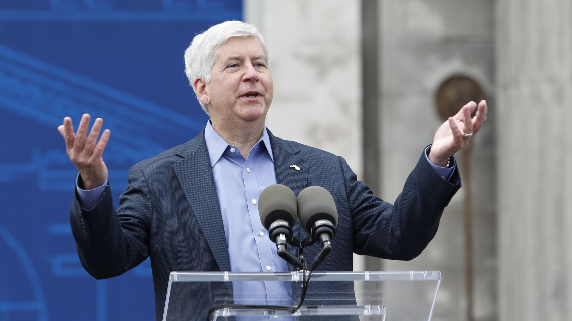 Then Michigan Governor Rick Snyder speaks at a press conference where the Ford Motor Company announced its plans to renovate the historic, 105-year old Michigan Central train station and Detroit's Corktown neighborhood into a hub for Ford's auto technology on June 19, 2018 in Detroit. (Bill Pugliano/Getty Images)