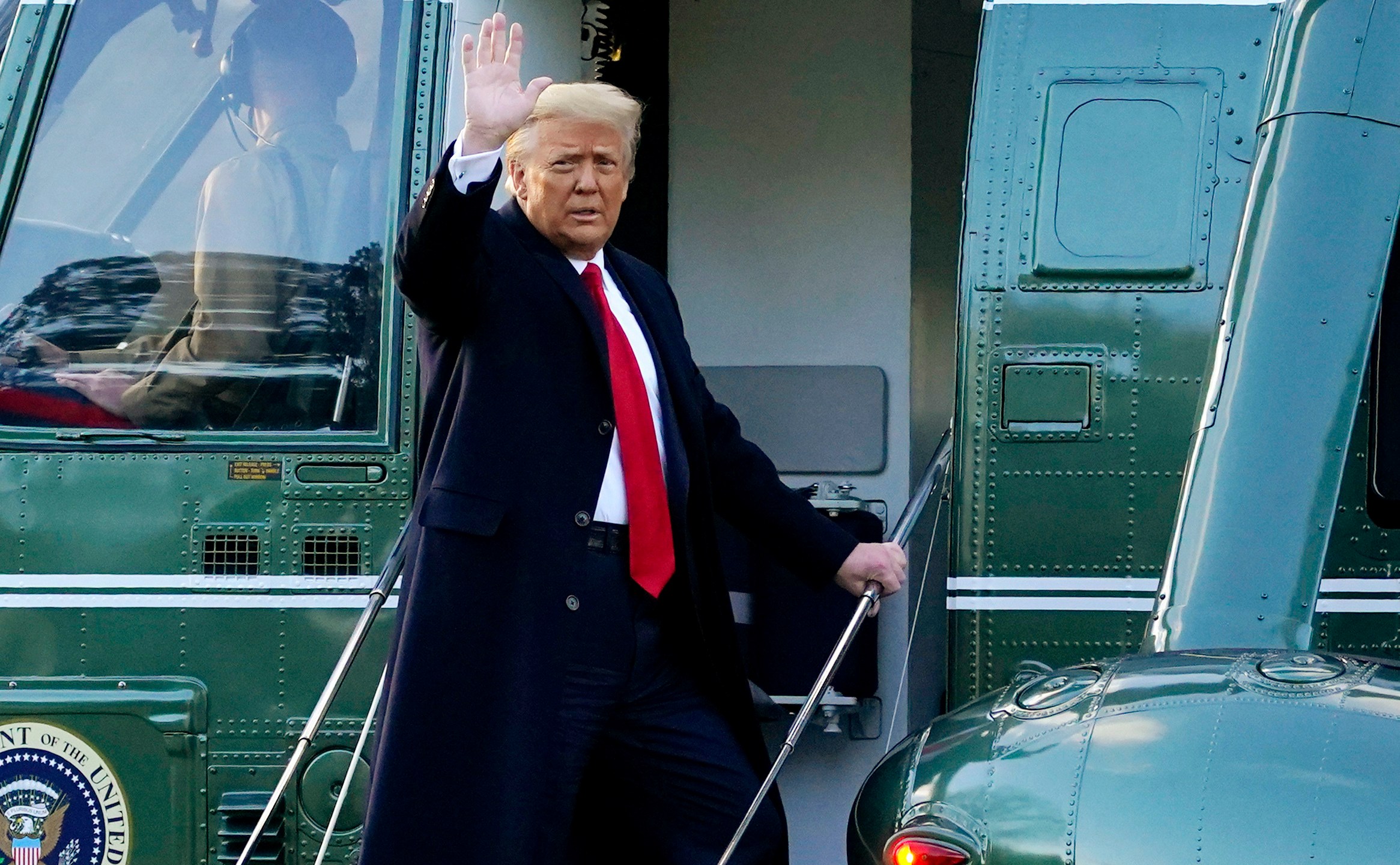 In this Wednesday, Jan. 20, 2021, file photo, Donald Trump waves as he boards Marine One on the South Lawn of the White House, in Washington, en route to his Mar-a-Lago Florida Resort. (AP Photo/Alex Brandon, File)