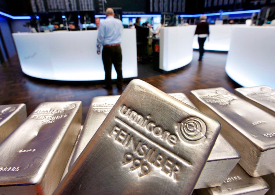 In this file photo dated Wednesday, May 9, 2007, Silver bullion, bars weighing five kilograms each, are displayed in the trading room of the stock exchange in Frankfurt, Germany. (AP Photo/Michael Probst, FILE)