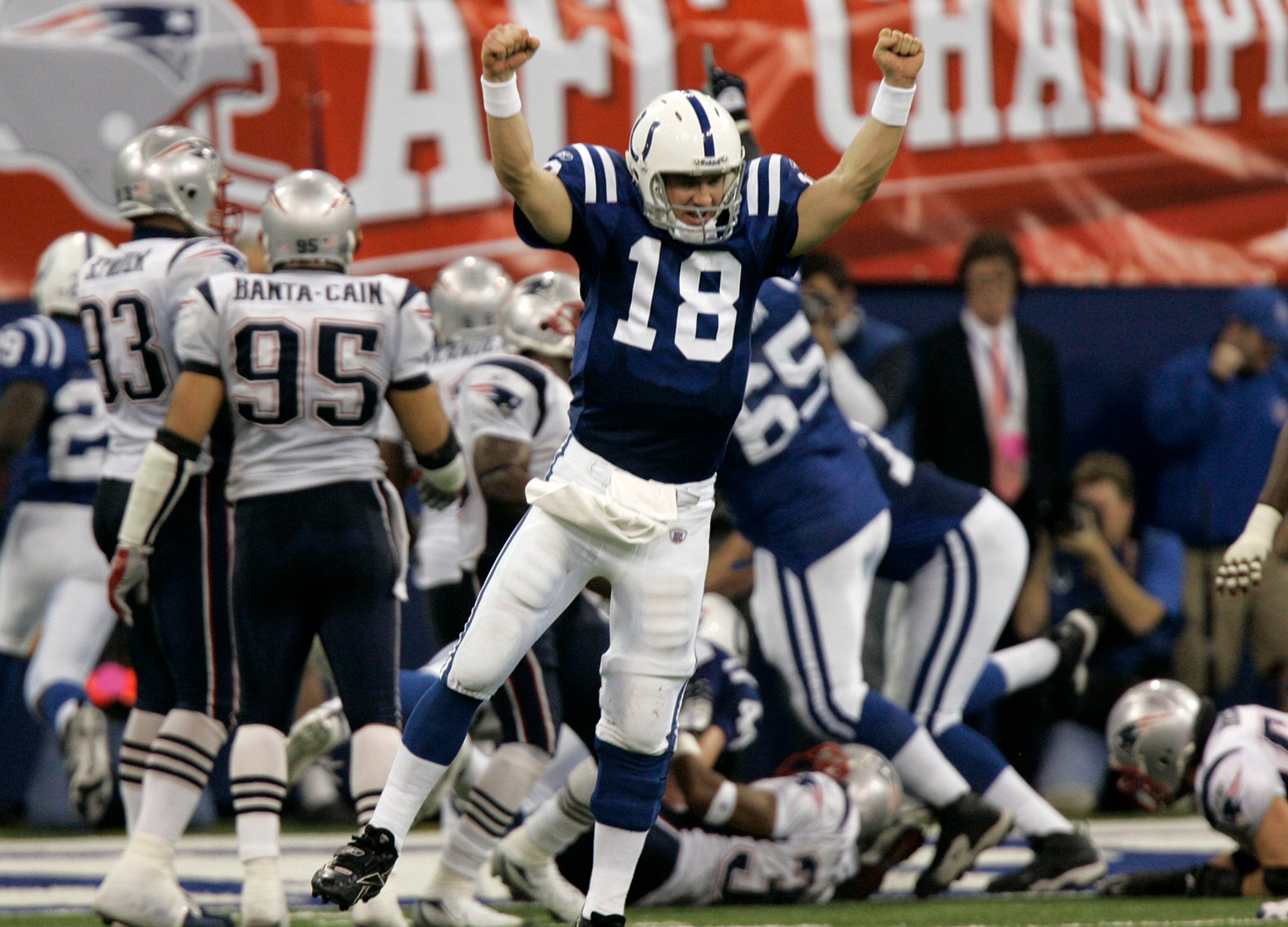 In this Jan. 21, 2007, file photo, Indianapolis Colts quarterback Peyton Manning (18) celebrates running back Joseph Addai's three-yard touchdown run in the fourth quarter of the AFC Championship football game against the New England Patriots, in Indianapolis. (AP Photo/Amy Sancetta)