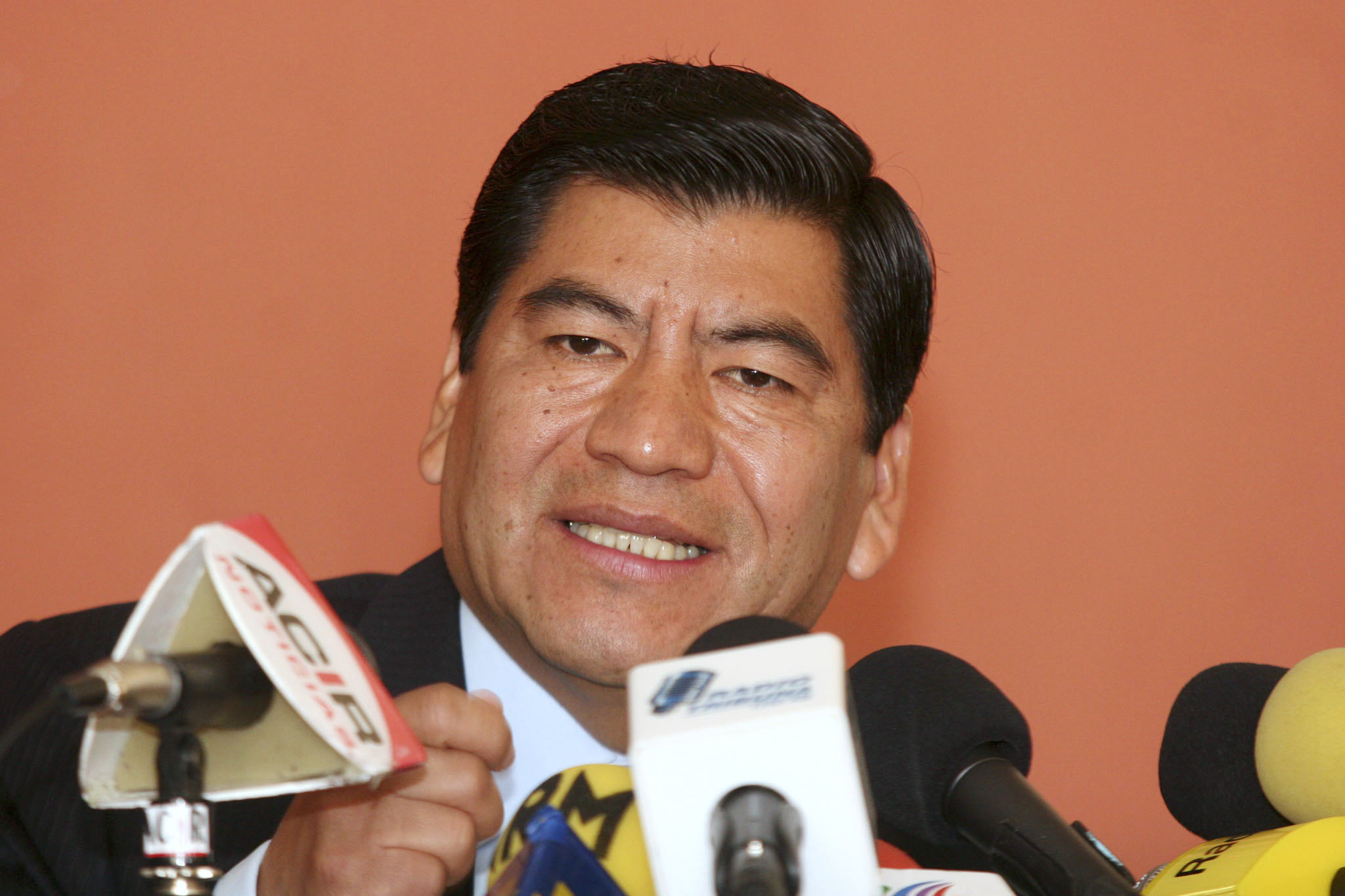 In this Feb. 15, 2006 file photo, the governor of the Mexican state of Puebla, Mario Marin speaks during a news conference in Puebla, Mexico. Mexican authorities arrested on Feb. 3, 2021 the former governor on charges that he had a reporter who investigated his role in a pedophilia ring illegally arrested and tortured, an official said Thursday, Feb. 4, 2021. (AP Photo/Joel Merino, File)