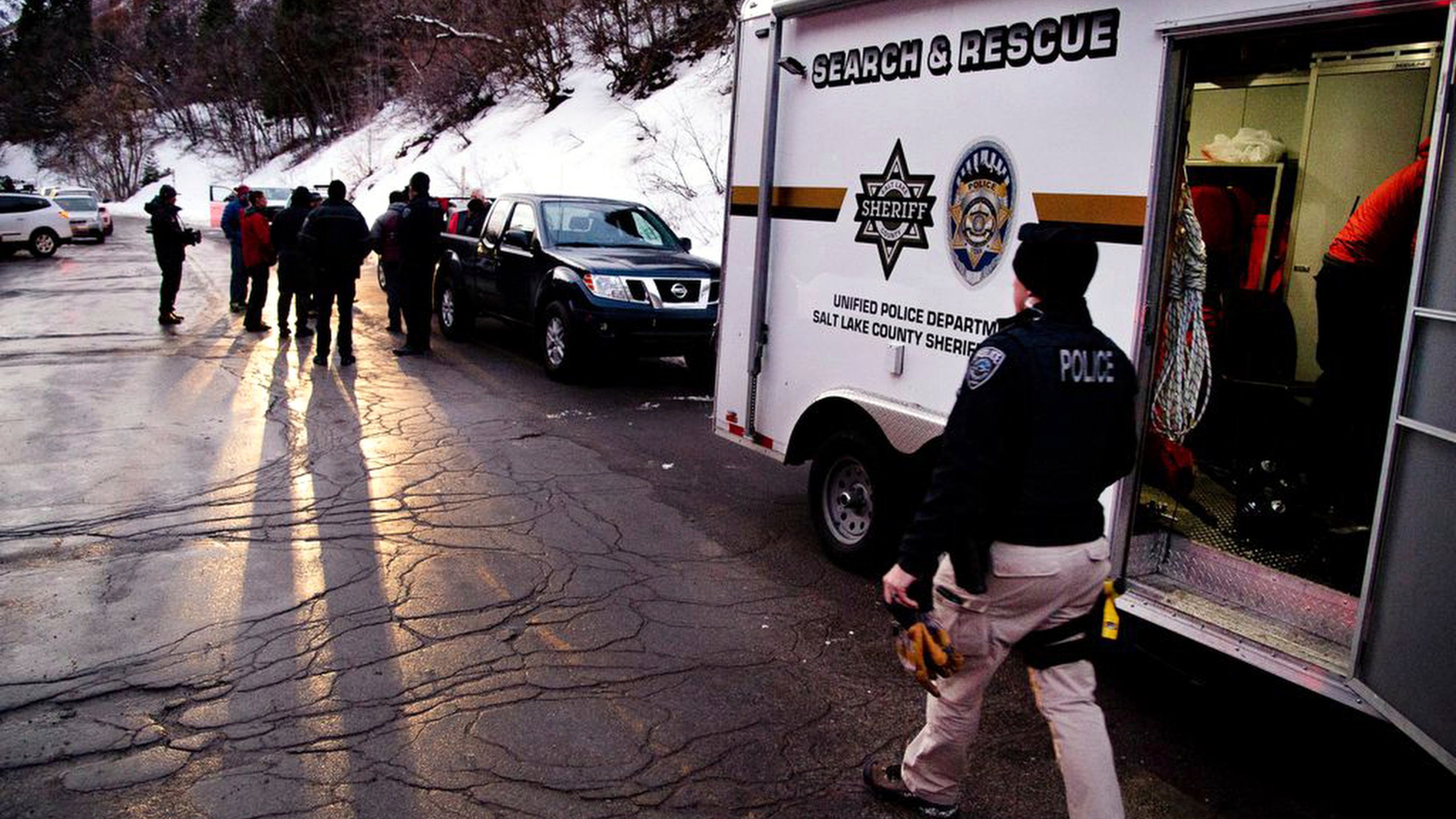 Salt Lake County Sheriff Search and Rescue crews respond to the top of Millcreek Canyon where four skiers died in an avalanche Saturday, Feb. 6, 2021, near Salt Lake City. (Francisco Kjolseth/The Salt Lake Tribune via AP)