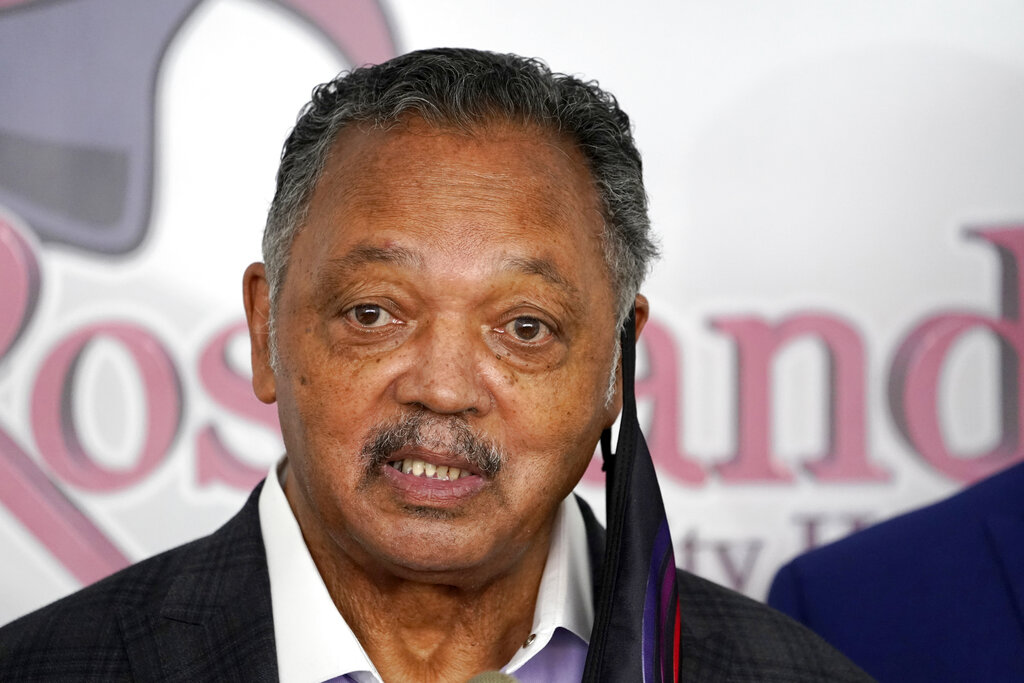 In this Friday, Jan. 8, 2021 file photo, Rev. Jesse Jackson speaks before receiving the Pfizer's BioNTech COVID-19 vaccine at the Roseland Community Hospital in Chicago. (AP Photo/Charles Rex Arbogast, File)