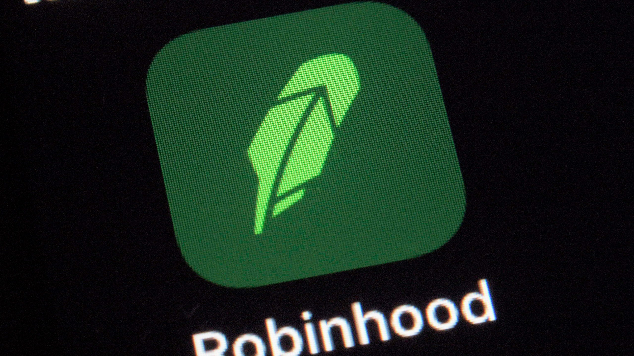 This Dec. 17, 2020, file photo shows the logo for the Robinhood app on a smartphone in New York. (AP Photo/Patrick Sison)