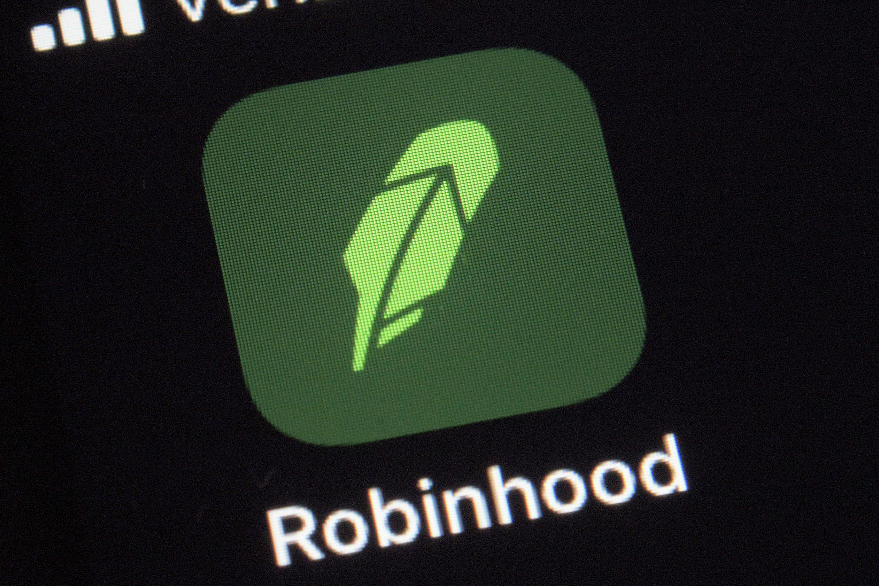 This Dec. 17, 2020, file photo shows the logo for the Robinhood app on a smartphone in New York. (AP Photo/Patrick Sison)