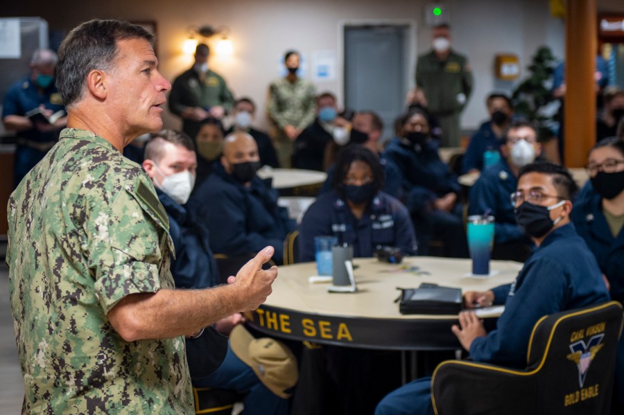 In this Feb. 8, 2021, photo provided by the U.S. Navy, Adm. John Aquilino, commander, U.S. Pacific Fleet, speaks with sailors assigned to the USS Carl Vinson after recent racist incidents. (Mass Communication Spc. Seaman Apprentice Mason Congleton / U.S. Navy via Associated Press)