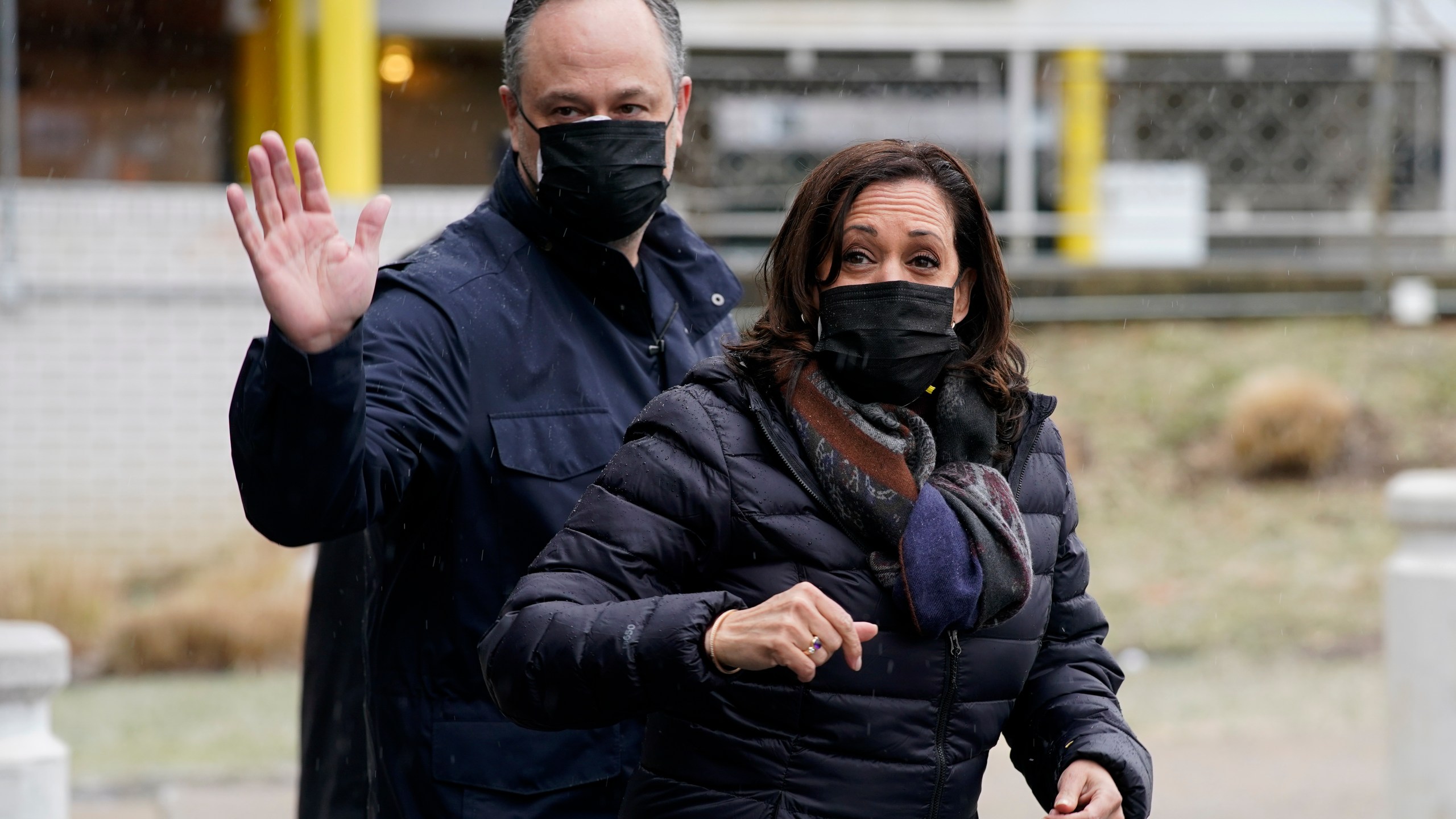 Vice President Kamala Harris and her husband Doug Emhoff depart after delivering baskets of cookies to health care workers at the VA Medical Center in Washington on Feb. 13, 2021. (AP Photo/Patrick Semansky)