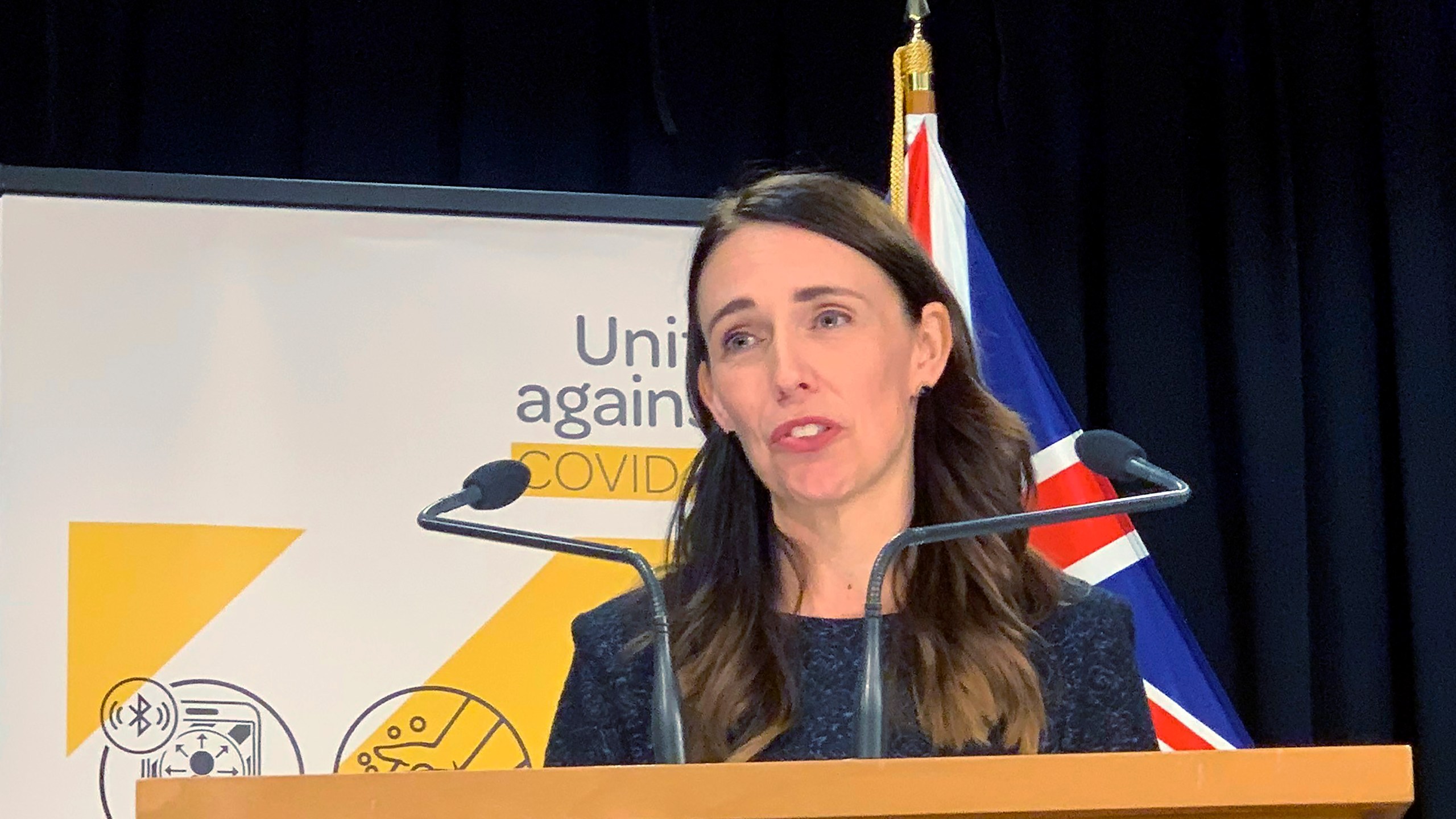 New Zealand's Prime Minister Jacinda Ardern talks to media in Wellington, New Zealand Monday, Feb. 15, 2021. (AP Photo/Nick Perry)