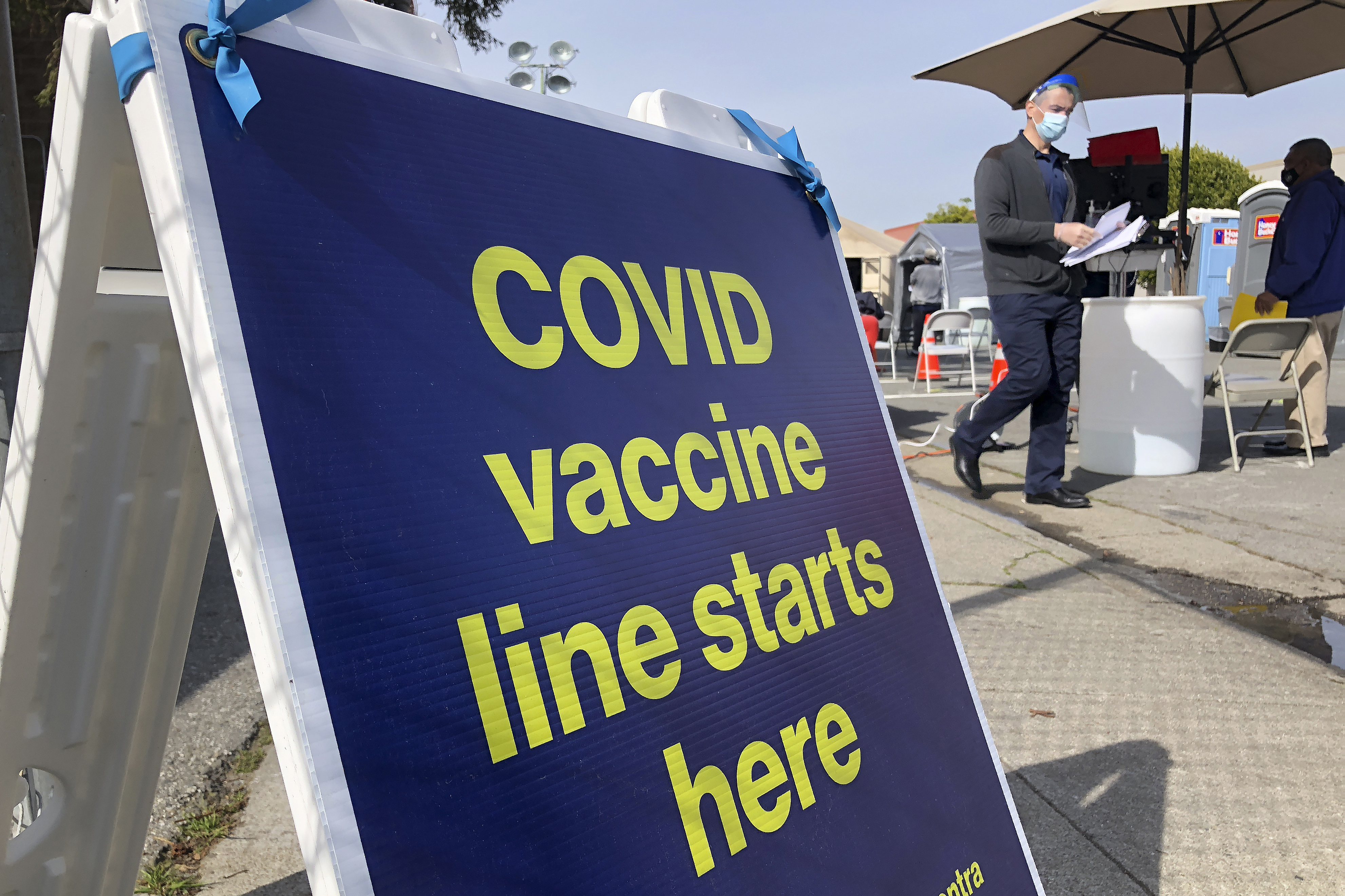 In this Feb. 8, 2021 file photo, a sign is shown at a COVID-19 vaccine site in the Bayview neighborhood of San Francisco. (AP Photo/Haven Daley, File)