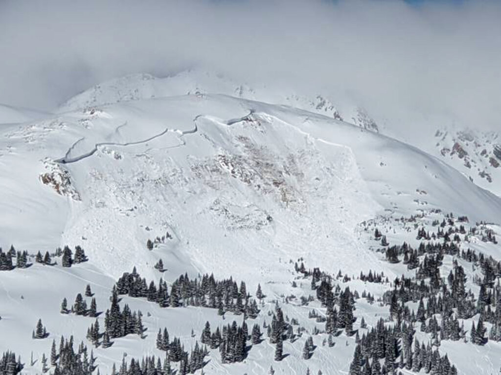 This image provided by Colorado Avalanche Information Center shows an avalanche that killed an unidentified snowboarder on Sunday, Feb. 14, 2021, near the town of Winter Park in Colorado. (Colorado Avalanche Information Center via AP)