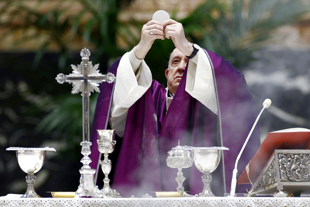 Pope Francis celebrates the Ash Wednesday mass leading Catholics into Lent, at St. Peter's Basilica at the Vatican, Wednesday, Feb. 17, 2021. (Guglielmo Mangiapane/Pool photo via AP)