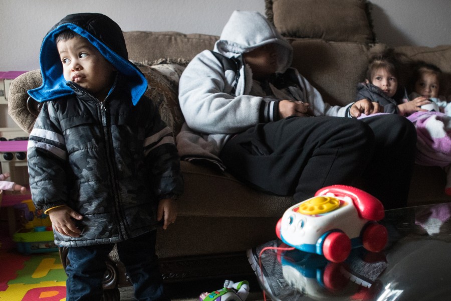 In this Feb. 15, 2021, file photo, Eithan Colindres wears a winter coat inside after the apartment his family lives in lost power following an overnight snowfall in Houston. (Brett Coomer/Houston Chronicle via AP, File)