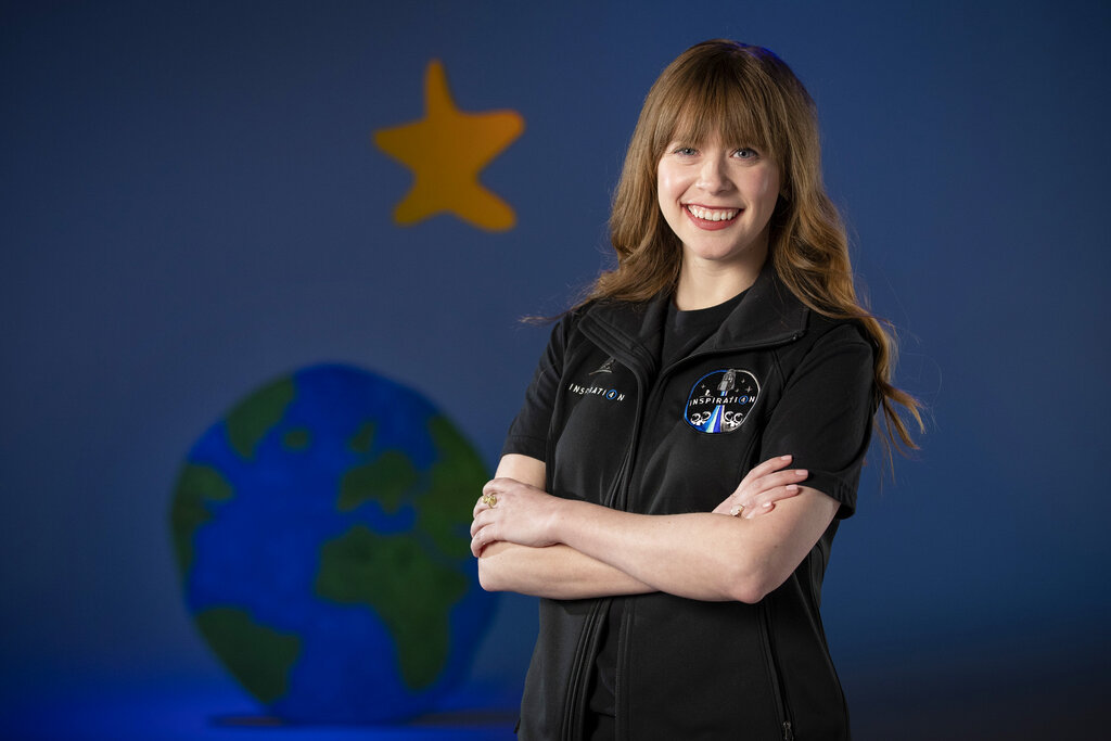 This Wednesday, Feb. 10, 2021 photo provided by St. Jude Children’s Research Hospital shows Hayley Arceneaux at the hospital in Memphis, Tenn. (Mike Brown/American Lebanese Syrian Associated Charities, St. Jude Children’s Research Hospital via AP)