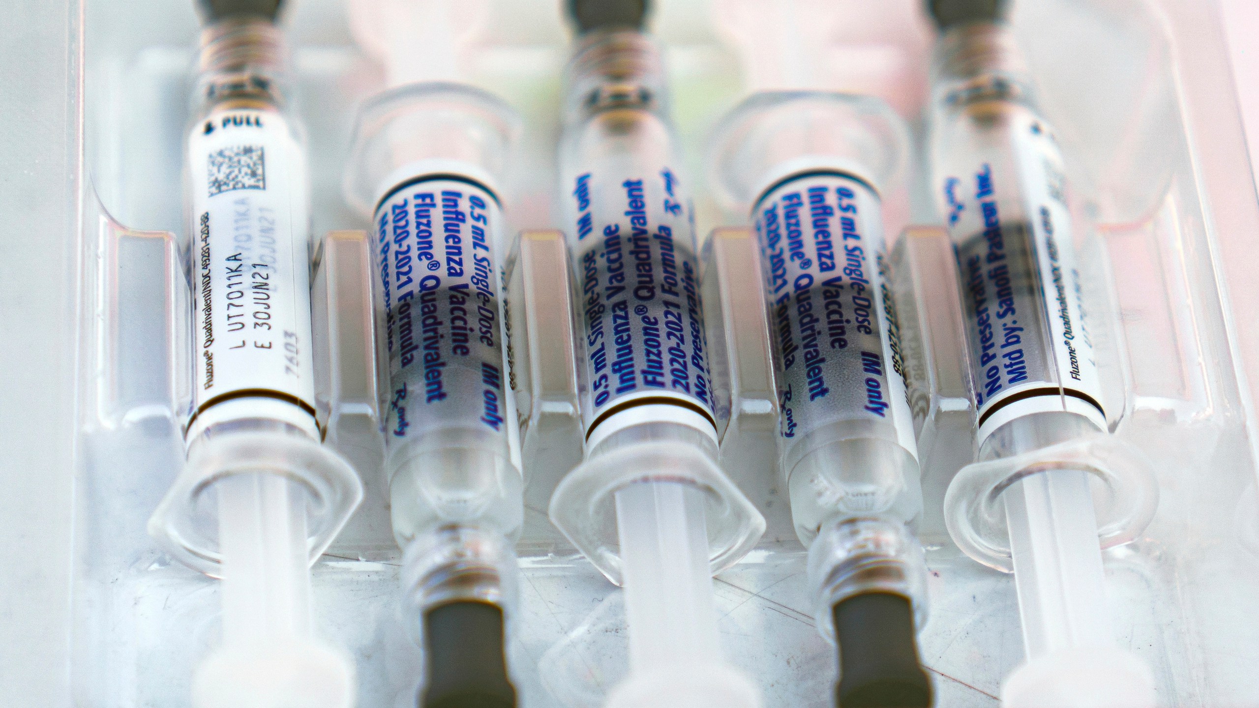 This Oct. 17, 2020, file photo shows influenza vaccine syringes at the L.A. Care Health Plan and Blue Shield of California Promise Health Plan's Community Resource Center's Free Drive-Thru vaccination event in Los Angeles. (AP Photo/Damian Dovarganes)