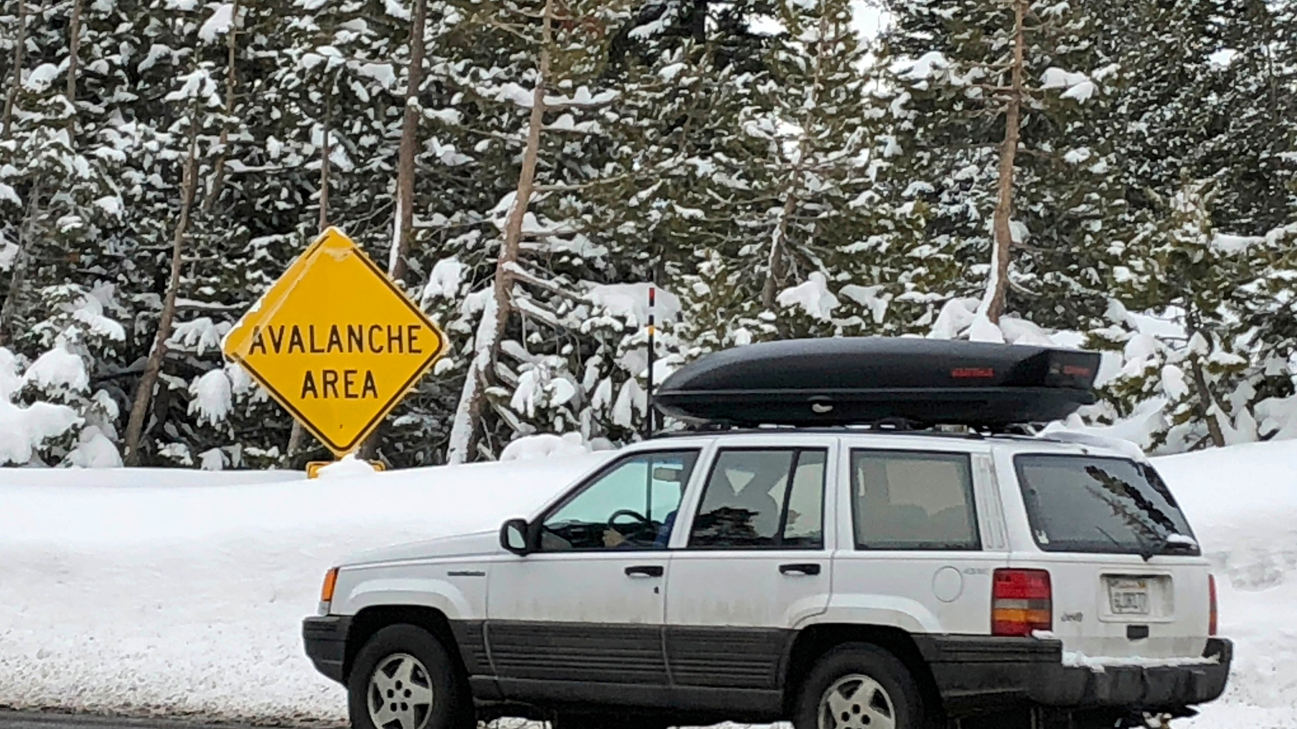 In this Jan. 17, 2020, file photo, skiers leave the parking lot at Alpine Meadows ski resort in California where an avalanche killed one skier and seriously injured another. (Scott Sonner/Associated Press)