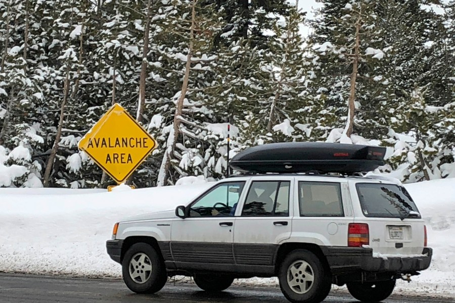 In this Jan. 17, 2020, file photo, skiers leave the parking lot at Alpine Meadows ski resort in California where an avalanche killed one skier and seriously injured another. (Scott Sonner/Associated Press)